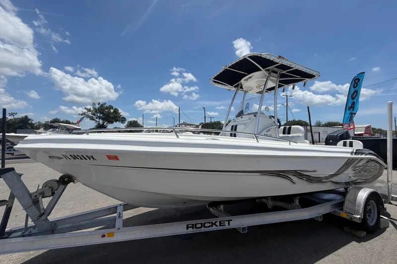 Slide: The Image of 2012 Glasstream 221 CC boat on trailer under clear blue sky. - 9