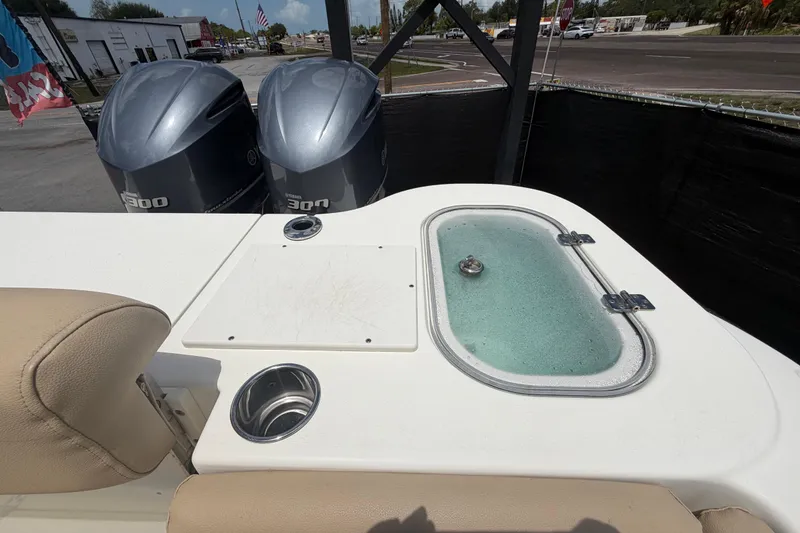Slide: The Image of 2018 NauticStar 28 XS boat with twin Yamaha 300 engines and livewell. - 72