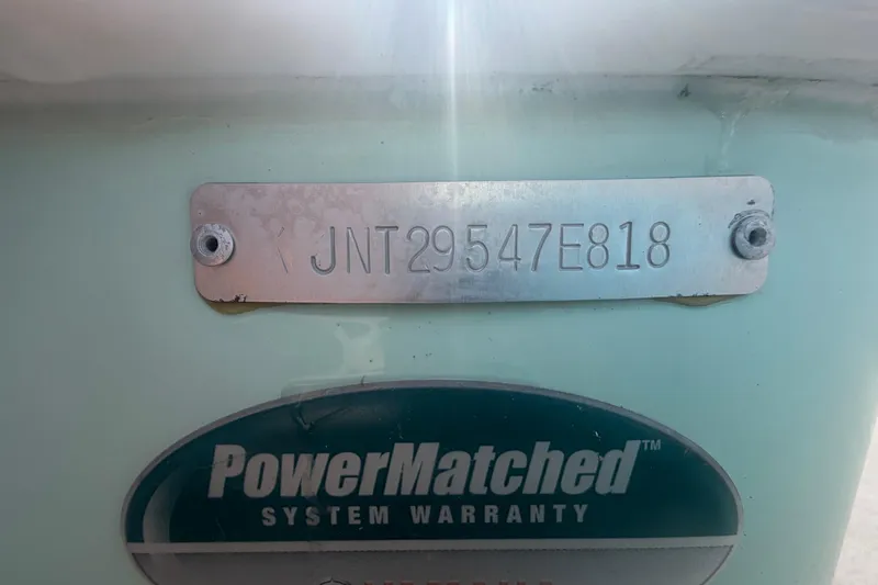 Slide: The Image of Hull identification number on 2018 NauticStar 28 XS boat with PowerMatched warranty label. - 81