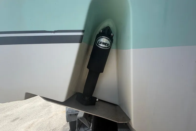 Slide: The Image of 2018 NauticStar 28 XS boat with Lenco trim tab actuator. - 10