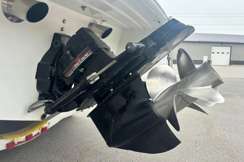Slide: The Image of Close-up of a 1994 Formula 232 LS boat's MerCruiser Bravo Three outdrive and propeller. - 19