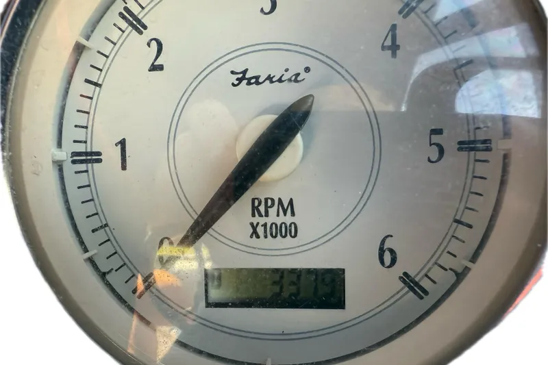 Slide: The Image of Close-up of a Faria tachometer showing RPM for a 2011 Regal 2565 Express Cruiser. - 6
