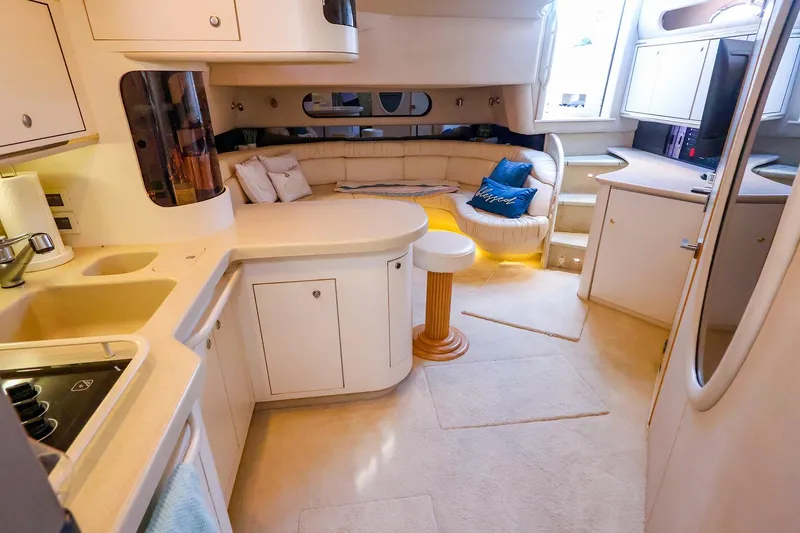 Slide: The Image of Luxurious interior of a 1998 Sea Ray 500 Sundancer yacht with modern amenities. - 32