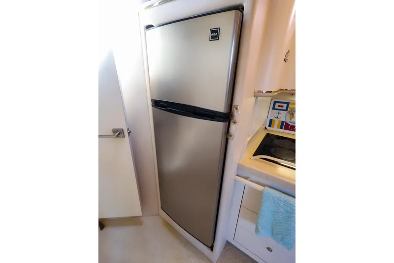 Slide: The Image of Stainless steel refrigerator in 1998 Sea Ray 500 Sundancer yacht kitchen. - 38