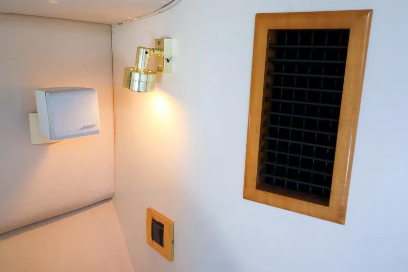 Slide: The Image of Interior of 1998 Sea Ray 500 Sundancer with speaker, light, and vent. - 53