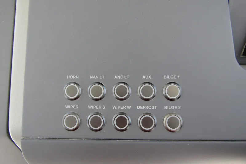Slide: The Image of Control panel of 2025 Nimbus Tender 11 with labeled buttons for various functions. - 19