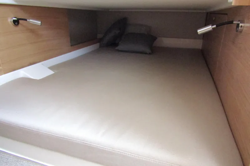 Slide: The Image of Cozy cabin bed in 2025 Nimbus Tender 11 yacht with modern lighting. - 32