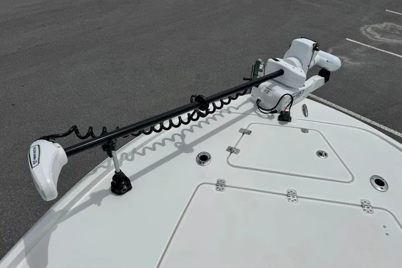 Slide: The Image of Bow of 2027 Caymas 26 HB boat with trolling motor and storage hatches. - 25