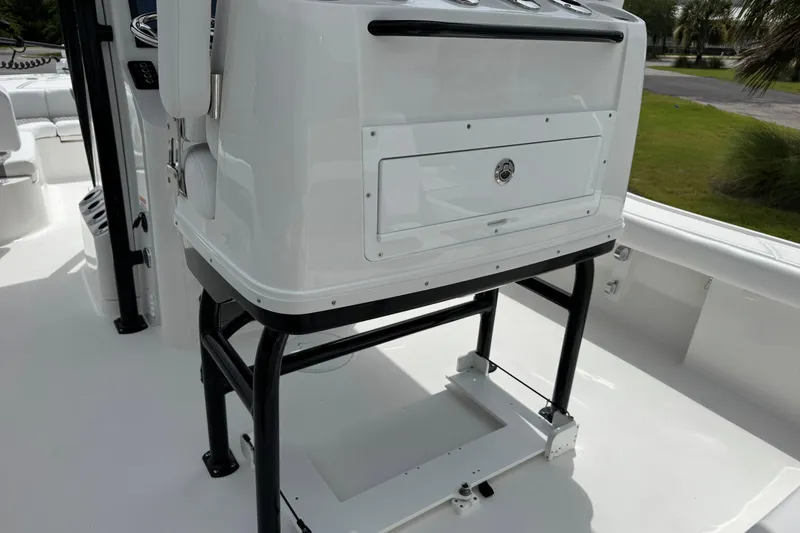Slide: The Image of 2027 Caymas 26 HB boat console with storage compartment and sleek design. - 15
