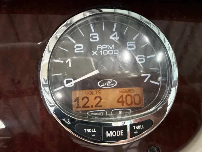 Slide: The Image of Close-up of a boat instrument with tachometer and digital displays. - 23