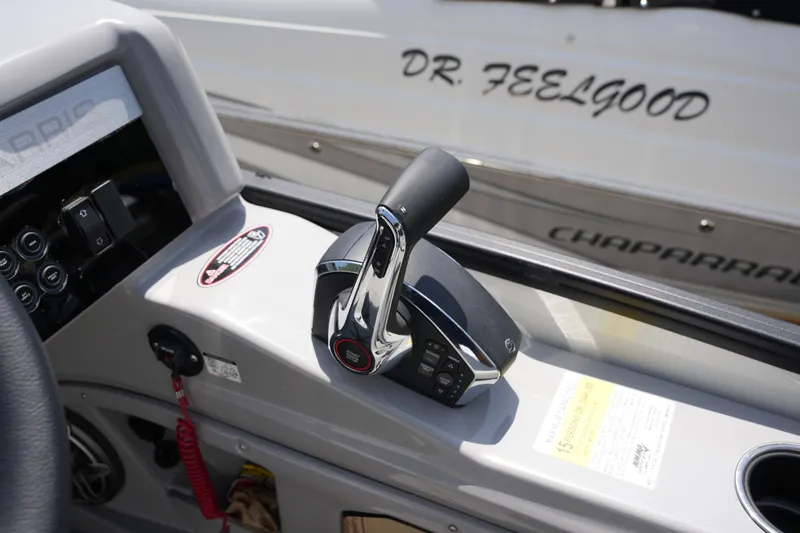 Slide: The Image of Close-up of the throttle lever on a Harris 250GM boat. - 28