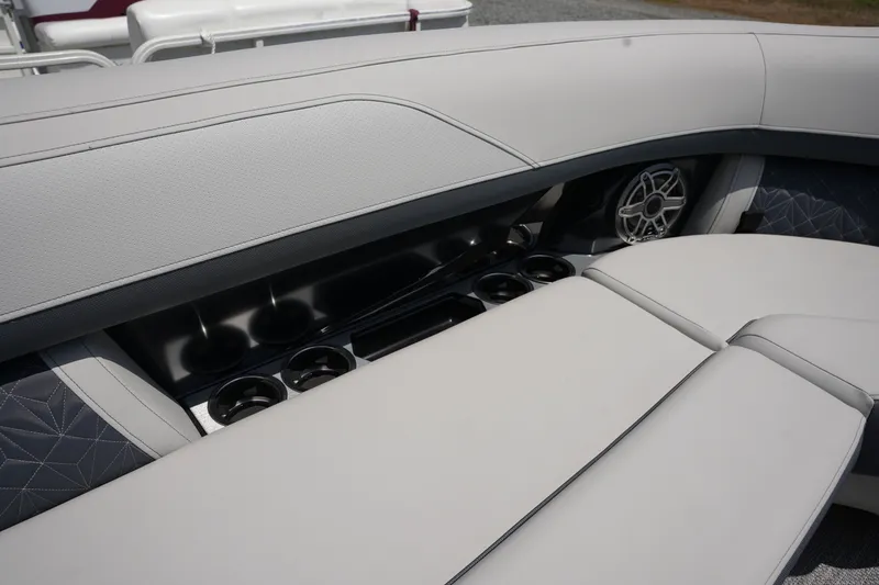 Slide: The Image of Interior of a 2027 Harris 250GM with sleek seating and speakers. - 15