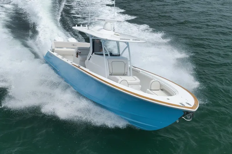 Slide: The Image of 2023 Valhalla Boatworks V-33 cruising on open water, showcasing sleek design and performance. - 49