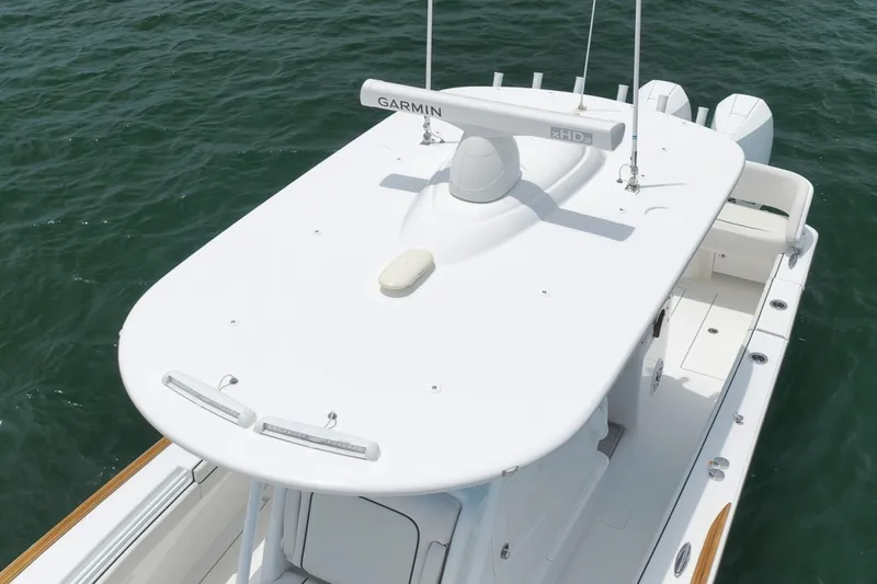 Slide: The Image of 2023 Valhalla Boatworks V-33 with Garmin radar, cruising on open water. - 4
