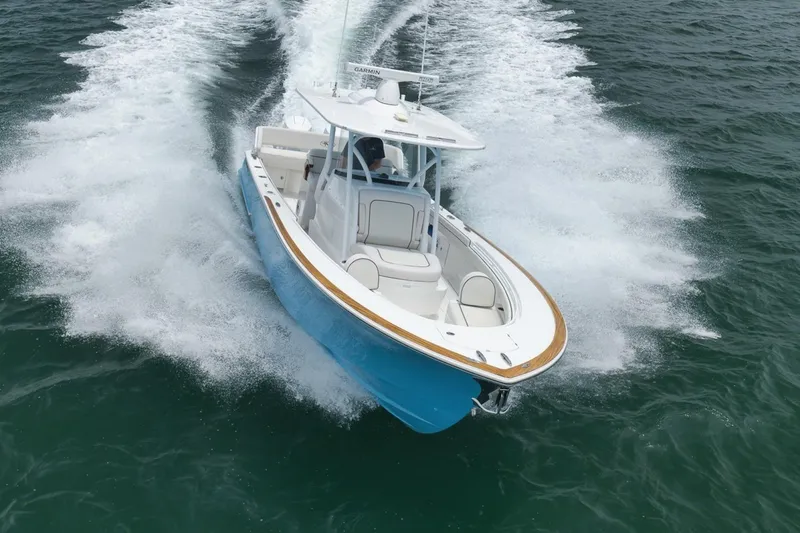 Slide: The Image of 2023 Valhalla Boatworks V-33 cruising on open water, showcasing sleek design and performance. - 48