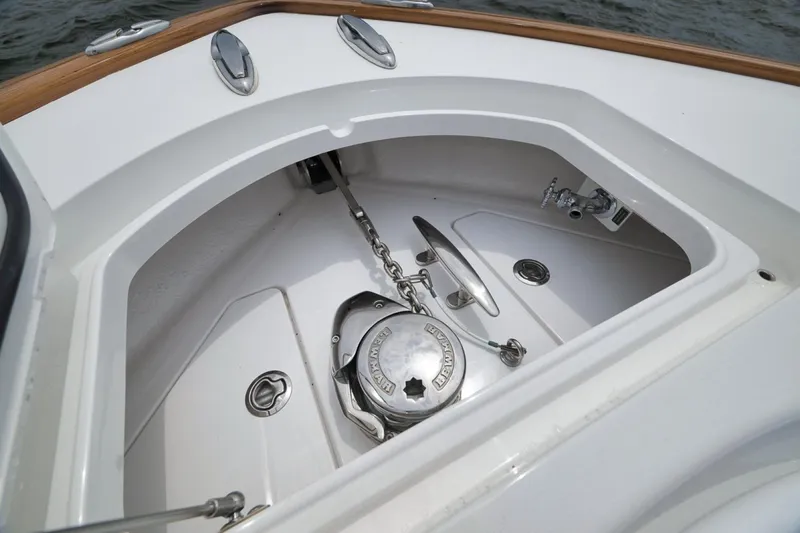 Slide: The Image of 2023 Valhalla Boatworks V-33 anchor locker with chain and cleat details. - 18