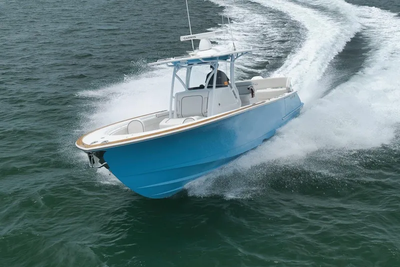 Slide: The Image of 2023 Valhalla Boatworks V-33 cruising on open water, showcasing sleek design and performance. - 50