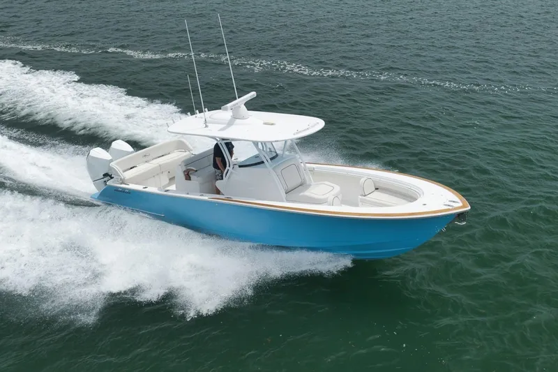 Slide: The Image of 2023 Valhalla Boatworks V-33 cruising on open water, showcasing sleek design and performance. - 47
