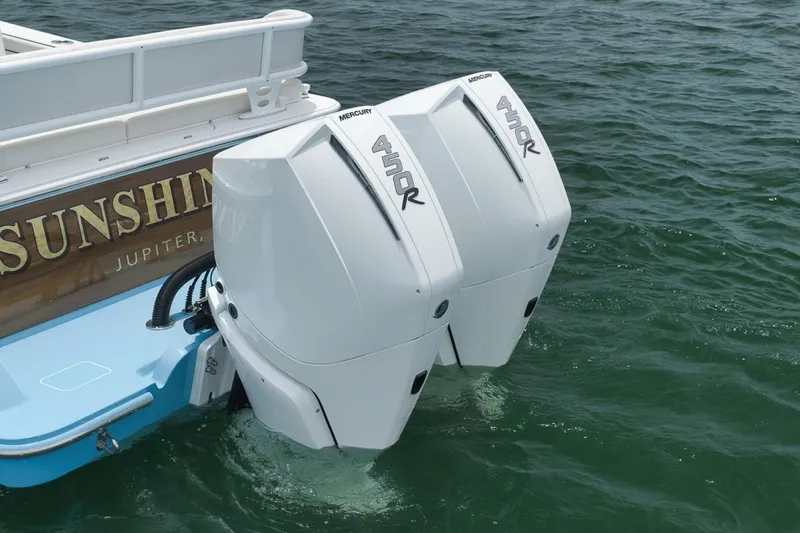 Slide: The Image of 2023 Valhalla Boatworks V-33 with twin Mercury 450R engines on water. - 10