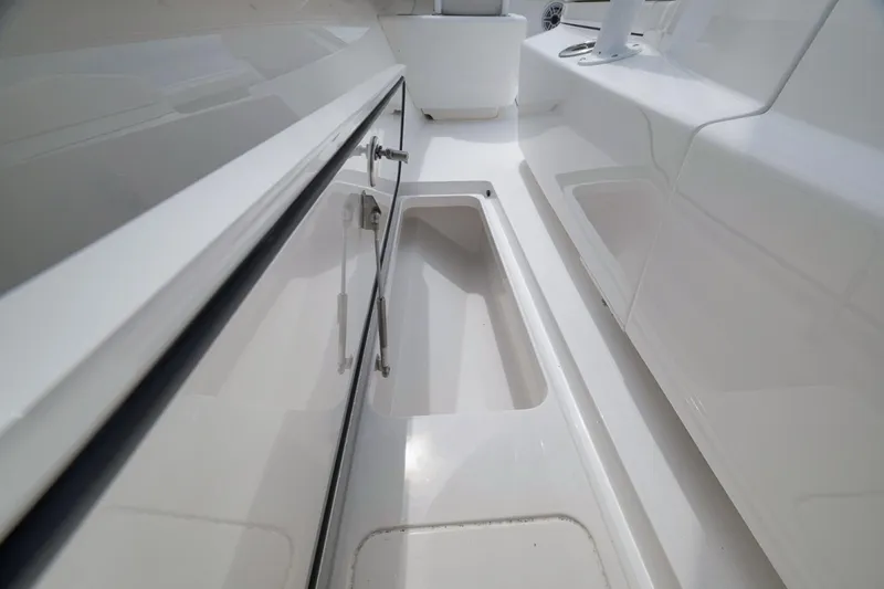Slide: The Image of 2023 Valhalla Boatworks V-33 interior storage compartment, showcasing sleek design and functionality. - 29