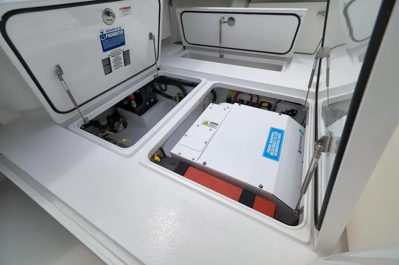 Slide: The Image of 2023 Valhalla Boatworks V-33 engine compartment with open hatches and visible equipment. - 41