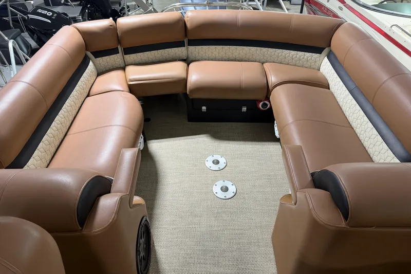 Slide: The Image of Luxurious seating on 2018 Godfrey Sanpan 2500 ULC pontoon boat, featuring tan upholstery. - 16