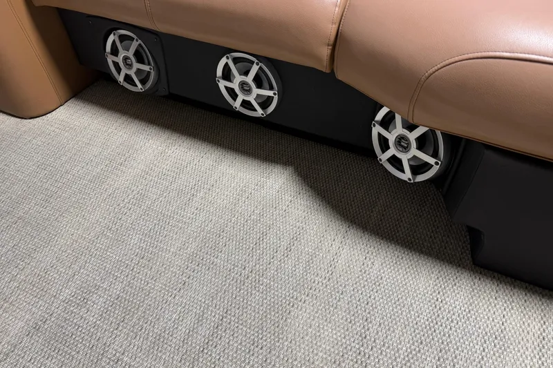 Slide: The Image of Speakers under tan leather seating on 2018 Godfrey Sanpan 2500 ULC boat. - 7