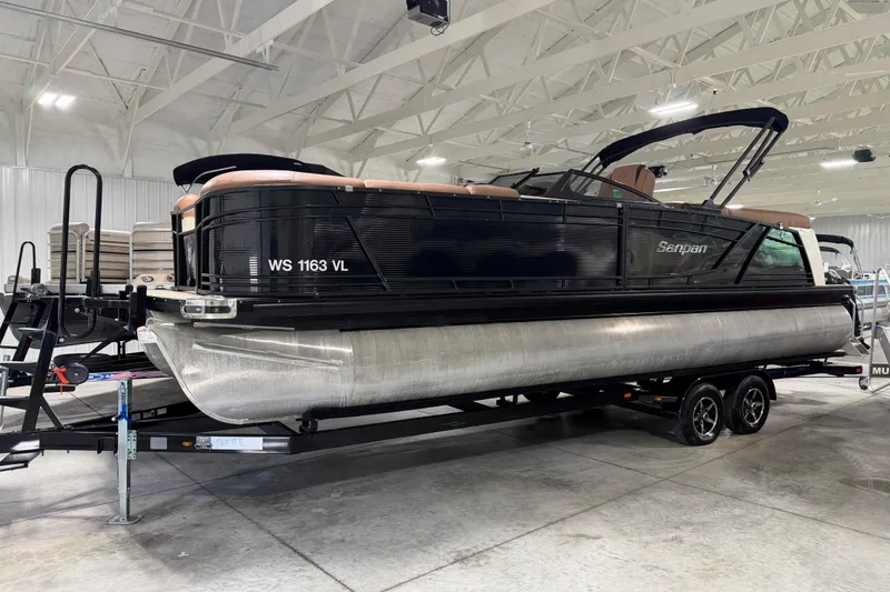 Slide: The Image of 2018 Godfrey Sanpan 2500 ULC pontoon boat on trailer in indoor showroom. - 2