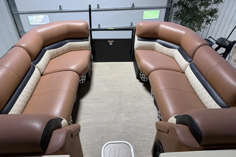 Slide: The Image of Luxurious interior of a 2018 Godfrey Sanpan 2500 ULC pontoon boat with plush seating. - 3