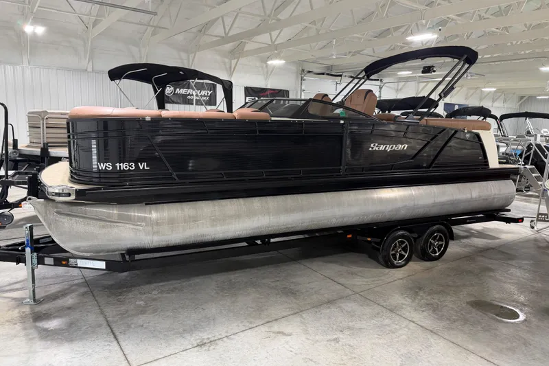Slide: The Image of 2018 Godfrey Sanpan 2500 ULC pontoon boat on trailer in indoor showroom. - 21