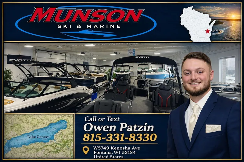 Slide: The Image of Munson Ski & Marine showroom featuring boats, contact details, and a smiling representative. - 22