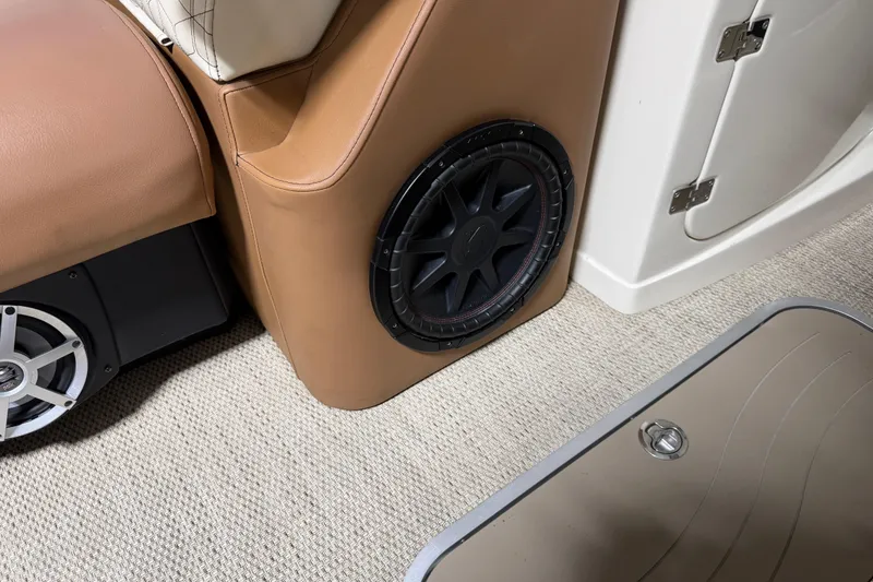 Slide: The Image of 2018 Godfrey Sanpan 2500 ULC interior with premium audio system and beige upholstery. - 9