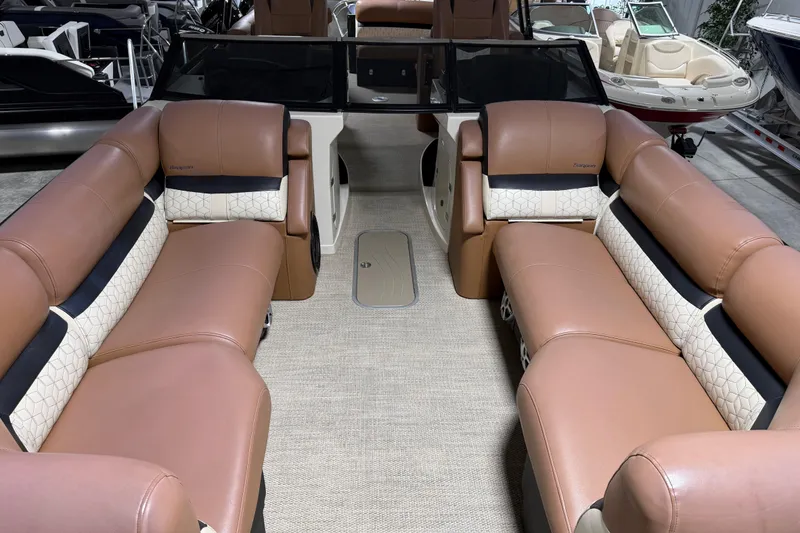 Slide: The Image of 2018 Godfrey Sanpan 2500 ULC pontoon boat interior with luxurious tan seating. - 4