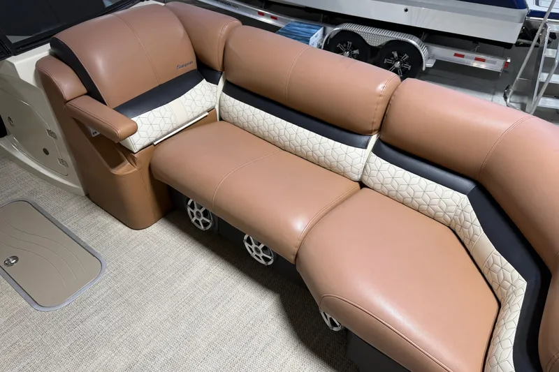 Slide: The Image of Luxurious seating on 2018 Godfrey Sanpan 2500 ULC pontoon boat, featuring tan and cream upholstery. - 6