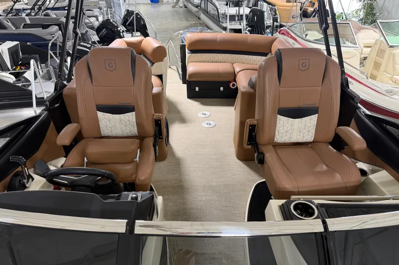Slide: The Image of 2018 Godfrey Sanpan 2500 ULC pontoon boat interior with luxurious seating and modern design. - 10