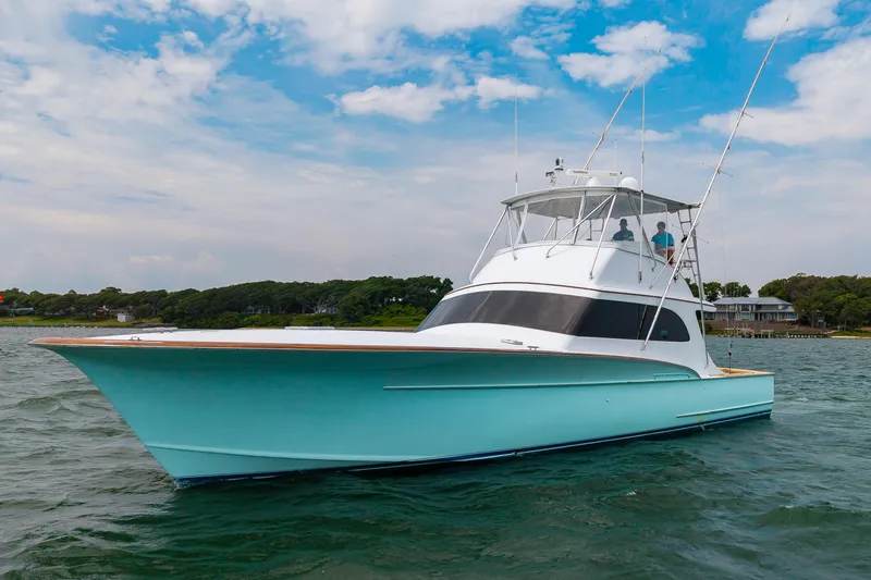 The Image of Custom Carolina Scarborough 56 Convertible yacht, 1993 model, cruising on open water. - 0
