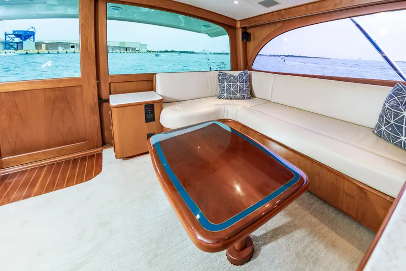 Slide: The Image of Luxurious interior of 1993 Custom Carolina Scarborough 56 Convertible yacht with elegant wood finishes. - 17