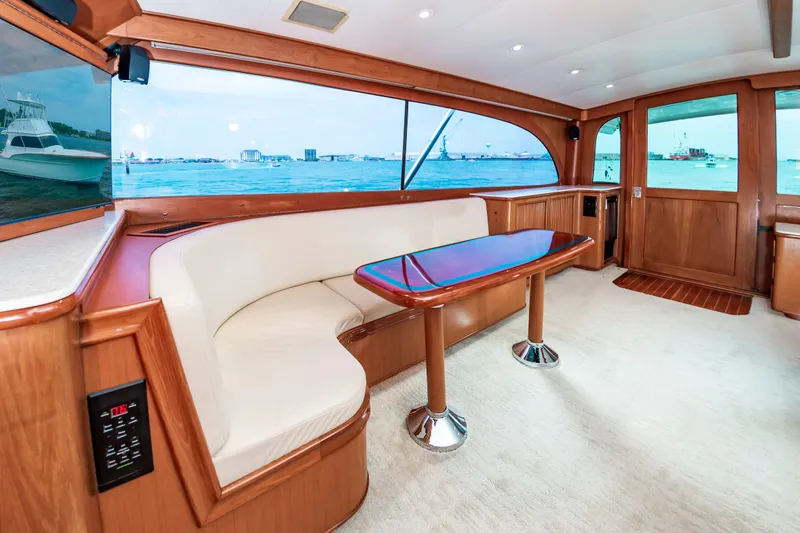 Slide: The Image of Luxurious interior of 1993 Custom Carolina Scarborough 56 Convertible yacht with ocean view. - 18