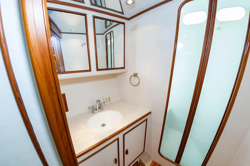 Slide: The Image of Luxurious bathroom interior of 1993 Custom Carolina Scarborough 56 Convertible yacht. - 29