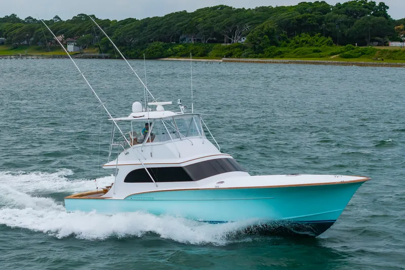 Slide: The Image of Custom Carolina Scarborough 56 Convertible yacht cruising on water, 1993 model. - 40