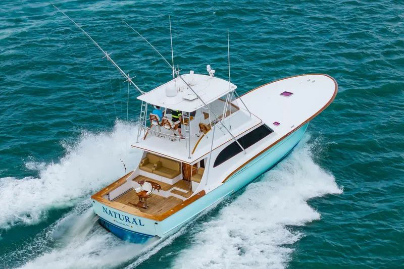 Slide: The Image of Custom Carolina Scarborough 56 Convertible yacht cruising on open water, 1993 model. - 62
