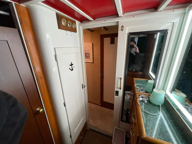 Slide: The Image of Interior of a 1951 Chris-Craft Catalina boat with nautical decor and wooden accents. - 20