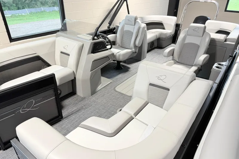 Slide: The Image of Luxurious interior of 2026 Qwest L-Class 20 RLS pontoon boat with elegant seating. - 1