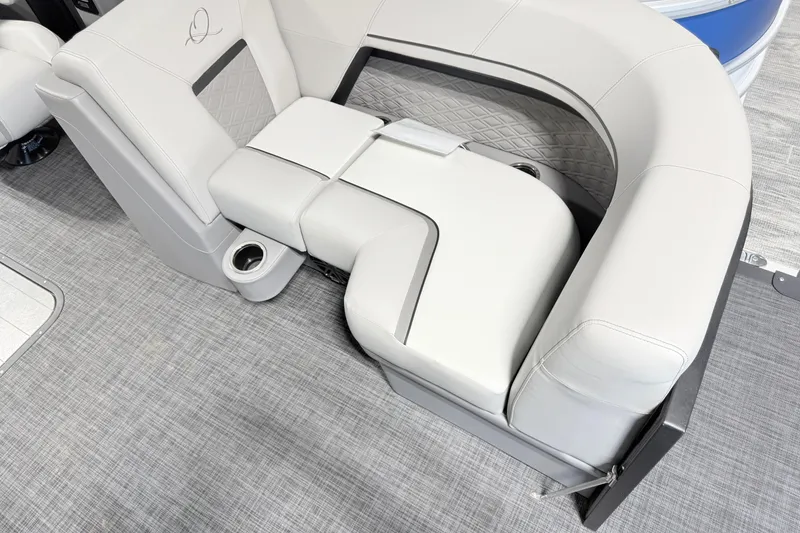 Slide: The Image of Luxurious seating in 2026 Qwest L-Class 20 RLS boat with cup holders and quilted design. - 11
