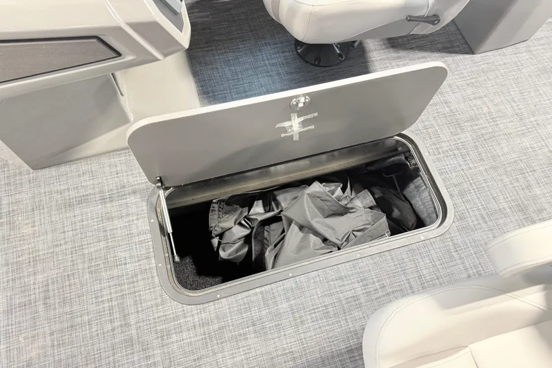 Slide: The Image of Storage compartment in 2026 Qwest L-Class 20 RLS boat, featuring sleek interior design. - 13