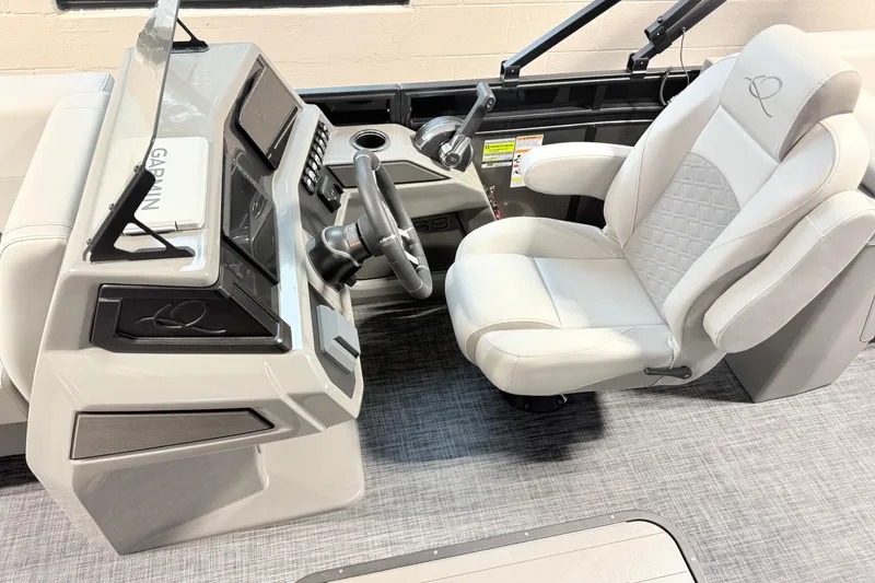 Slide: The Image of 2026 Qwest L-Class 20 RLS boat interior with modern helm and luxurious captain's chair. - 14