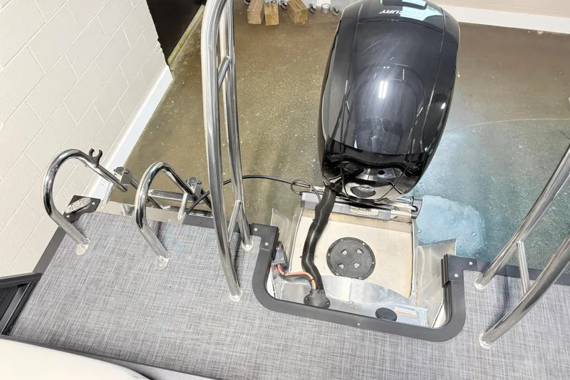 Slide: The Image of Overhead view of 2026 Qwest L-Class 20 RLS boat motor and railing. - 16