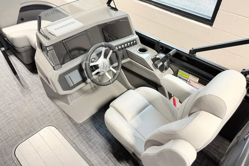 Slide: The Image of Interior of 2026 Qwest L-Class 20 RLS boat with modern helm and plush seating. - 3