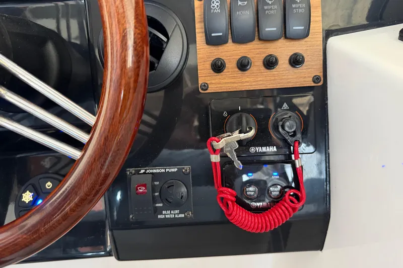 Slide: The Image of Control panel of 2023 Cutwater C-288 Coupe with Yamaha ignition and steering wheel. - 39
