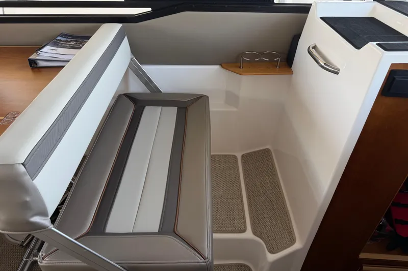Slide: The Image of Interior seating area of 2023 Cutwater C-288 Coupe, featuring modern design and comfortable upholstery. - 40